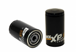 Two black Wix XP 5W30 oil filters, one standing upright and the other lying on its side, shown against a plain white background.